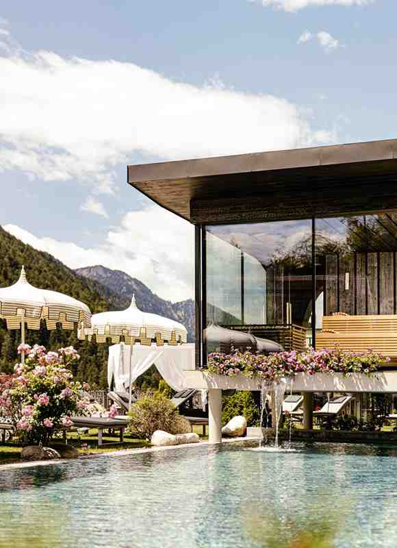 The outdoor pool and the panoramic sauna in summer